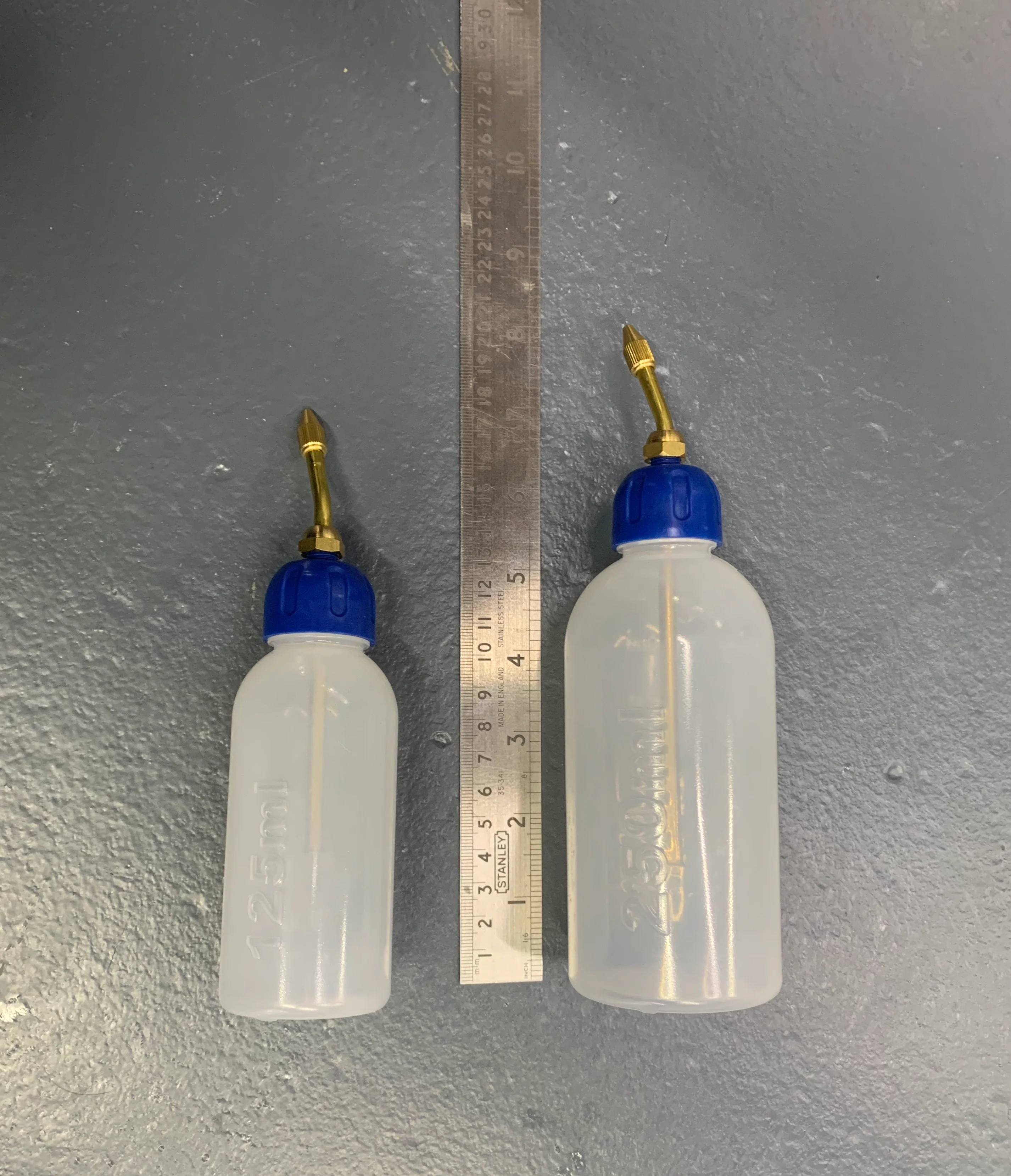 Empty Refillable Lockable Bottle with Angled Spout